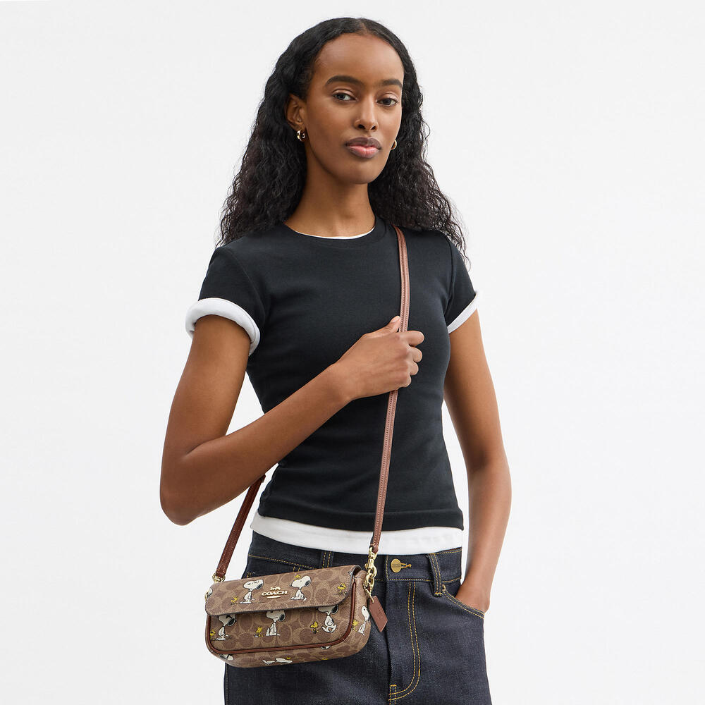 Coach X Peanuts Hailey Flap Bag In Signature Canvas With Snoopy Print